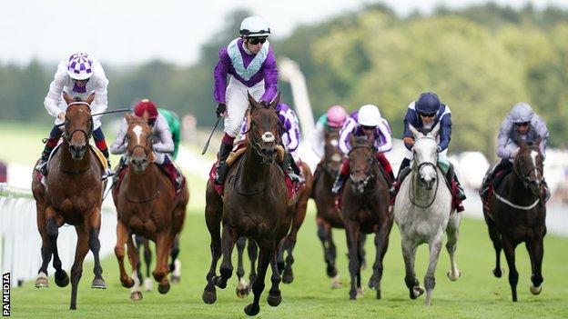 Alcohol Free and Oisin Murphy (centre) coming home to win the Qatar Sussex Stakes