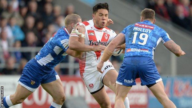 Andre Savelio of St Helens being tackled