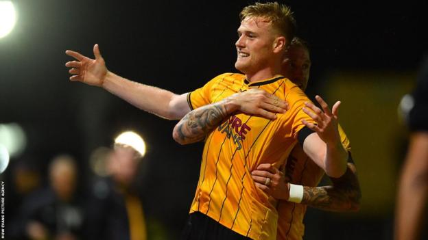 Will Evans celebrates scoring a goal