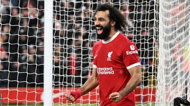 Liverpool's Mohamed Salah celebrates scoring against Newcastle in the Premier League