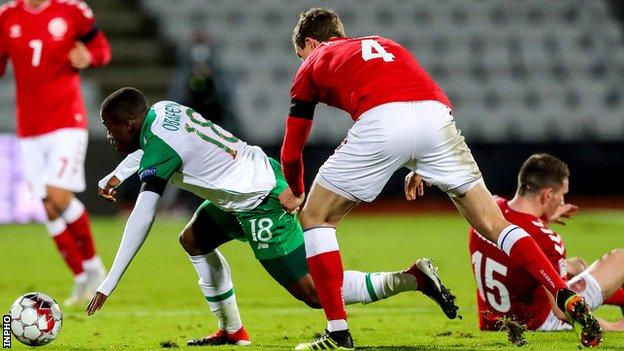Michael Obafemi tries to burst away from Denmark's Andreas Bjelland after coming on for his first Republic cap