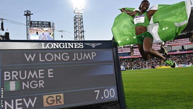 Nigeria's Ese Brume celebrates winning women's long jump gold in a new Commonwealth Games record