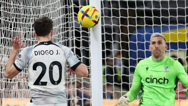 Diogo Jota heads against the post