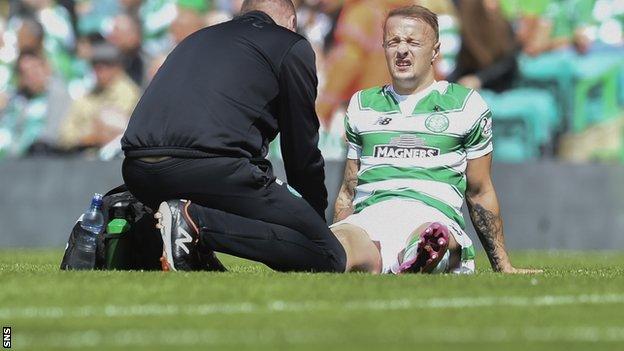 Celtic's Leigh Griffiths lies injured