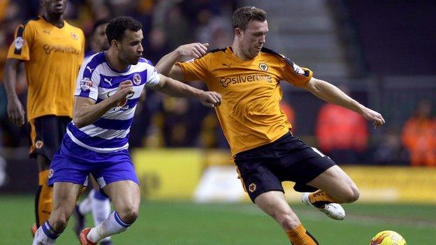 Wolves midfielder Kevin McDonald is challenged by Reading's Welsh international Hal Robson-Kanu