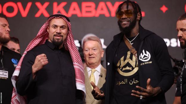 Joseph Parker and Deontay Wilder poses for pictures at a news conference