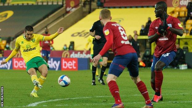 Emi Buendia scores Norwich's third goal against Huddersfield