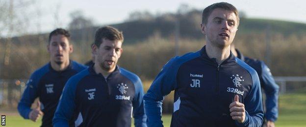 Jordan Rossiter (right) trains with Rangers