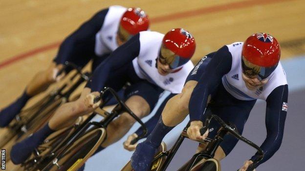 Philip Hindes, Chris Hoy and Jason Kenny compete during the team sprint event at the London 2012 Olympics