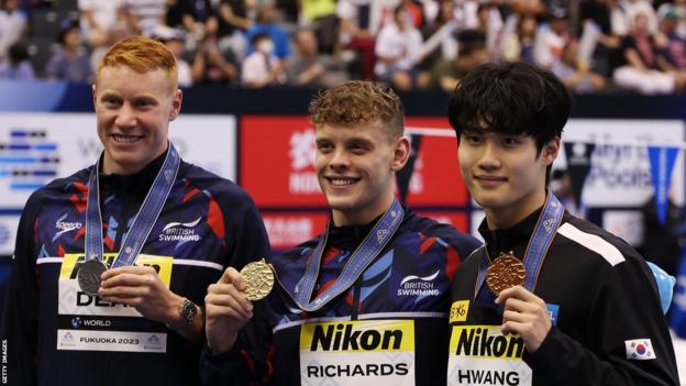 Tom Dean, Matt Richards and Hwang Sun-woo receive their medals