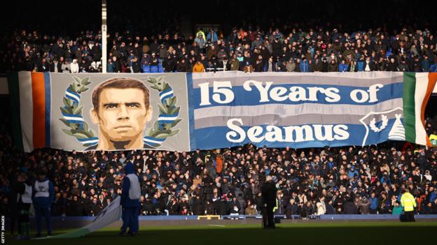Everton fans with a banner in honour of long-serving defender Seamus Coleman
