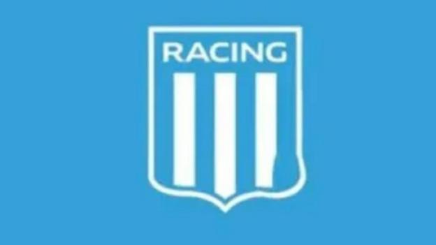 Racing Club badge with a part of one of it's white batons missing