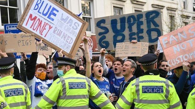 Chelsea fans protest against their club signing up to play in the ESL