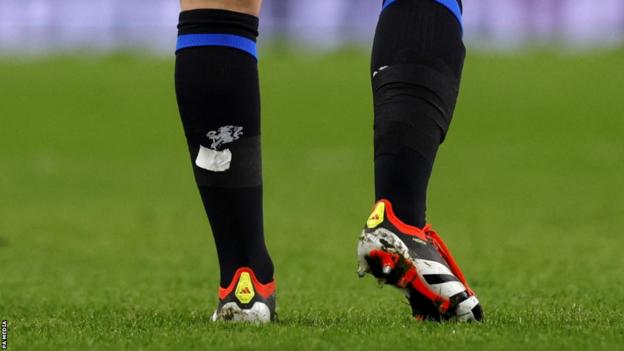 Arsenal players in Chelsea socks