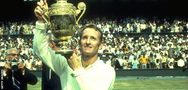Rod Laver lifting the Wimbledon trophy in 1969