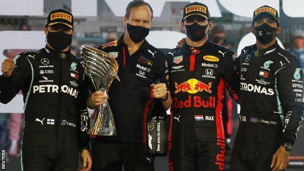 Mercedes duo Valtteri Bottas and Lewis Hamilton with Red Bull's Max Verstappen after the Abu Dhabi Grand Prix