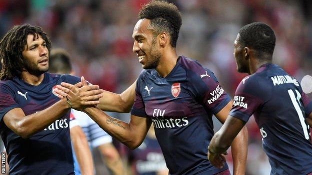 Pierre-Emerick Aubameyang (centre) celebrates scoring for Arsenal