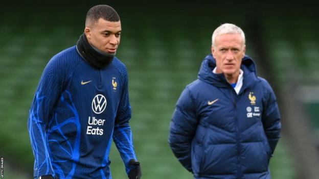 Kylian Mbappe and Didier Deschamps during a training session in Dublin's Aviva Stadium