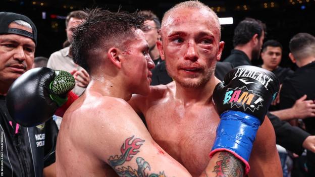 Jesse 'Bam' Rodriguez and Sunny Edwards embrace post fight