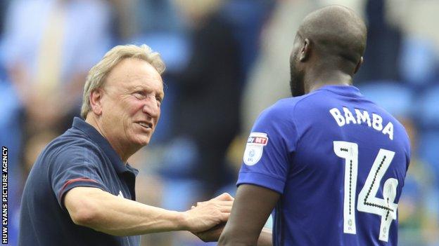 Neil Warnock with Sol Bamba