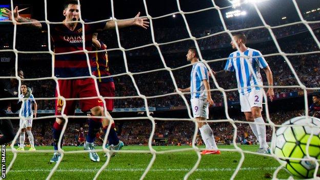Lionel Messi celebrates Thoams Vermaelen's winning goal