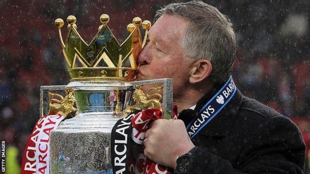 Sir Alex Ferguson with the Premier League trophy in 2013