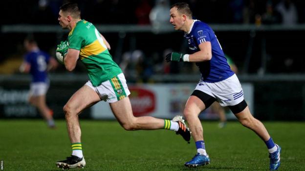 Glen's Ciaran McFaul attempts to burst away from Scotstown's Jack McCarron