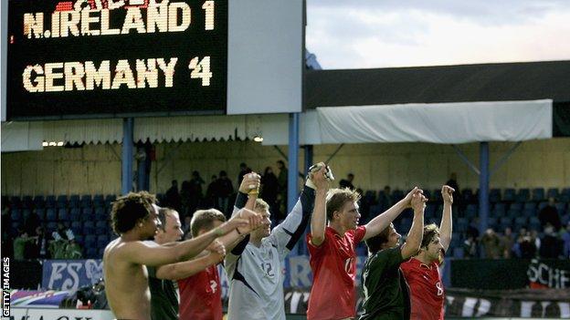 German players celebrate their 4-1 win over NI in front of the old Railway Stand in June 2005