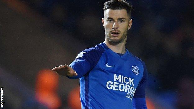 Andrew Hughes: Three Preston bids for Peterborough defender turned down ...