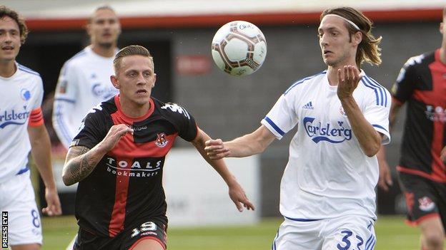 Matthew Snoddy and Rasmus Falk in action during the Champions League qualifier at Seaview