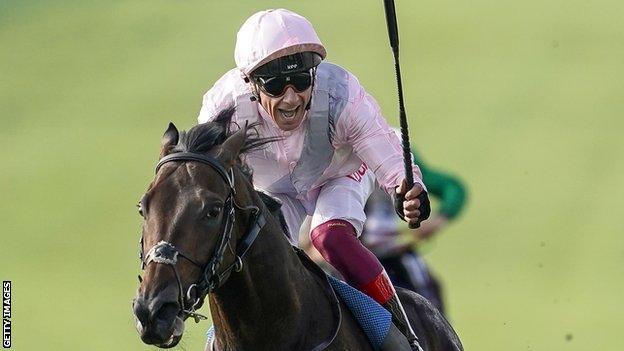 Frankie Dettori rides Too Darn Hot to victory at Newmarket