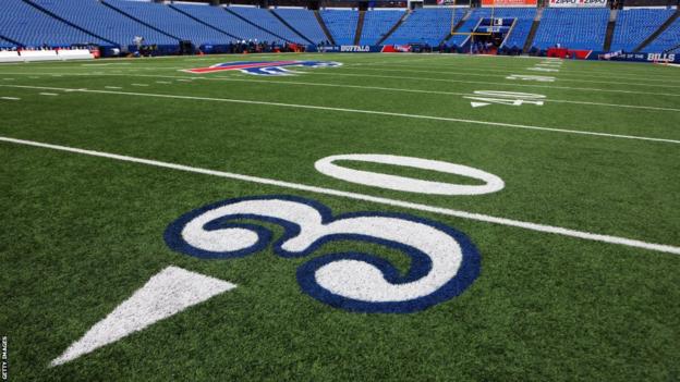 The number three is sprayed with a blue outline in the colour of the Buffalo Bills to honour Damar Hamlin