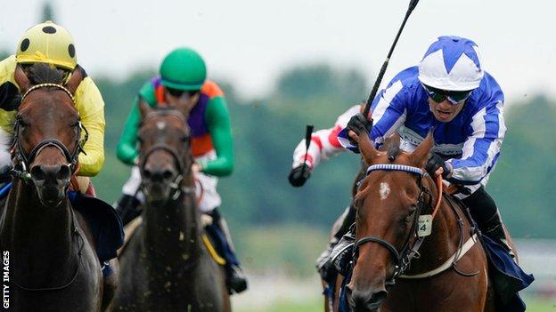 Winter Power (right) saw off Emaraaty Ana (left in yellow) to win the Group One race