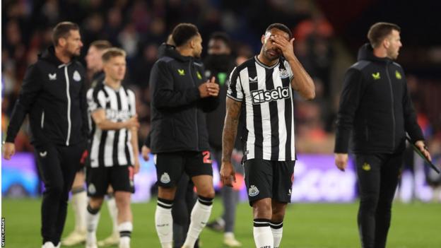 Newcastle players look despondent at the final whistle after losing to Crystal Palace