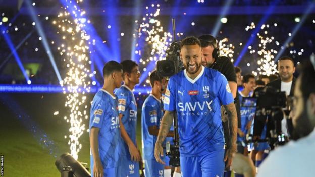 Neymar smiles at his official unveiling as an Al-Hilal player