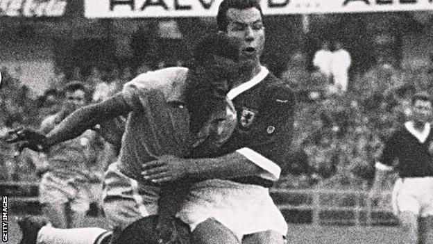 Wales' Mel Charles (right) challenges Pele of Brazil during their 1958 World Cup quarter-final