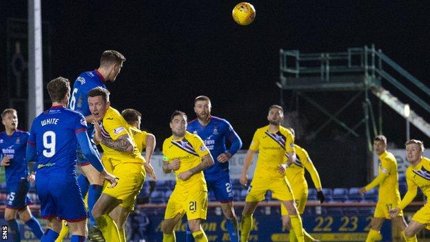 Chris McCart heads in Inverness' second goal