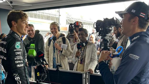 George Russell and Alex Albon joke in the media pen after qualifying