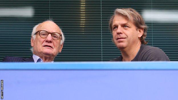 Chelsea chairman Bruce Buck (left) and propsective new owner Todd Boehly (right) watch a Premier League game