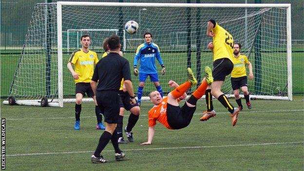 A player attempts an overhead kick during a GFSN fixture