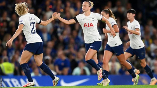 Martha Thomas celebrates scoring against Chelsea