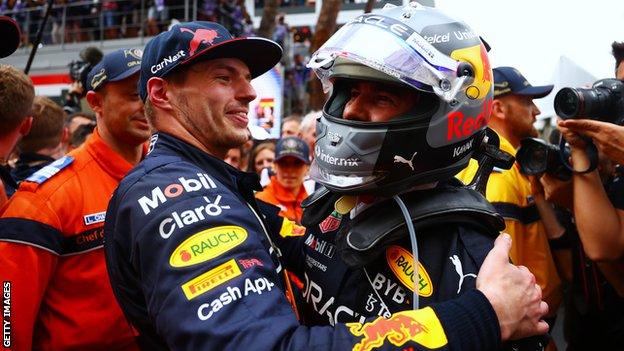 Max Verstappen and Sergio Perez hug