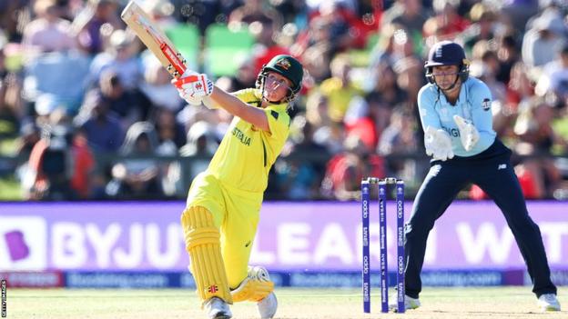 Australia's Beth Mooney plays a shot during the 2022 Cricket World Cup final against England