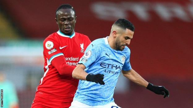 Liverpool and Senegal's Sadio Mane (left) up against Manchester City and Algeria's Riyad Mahrez