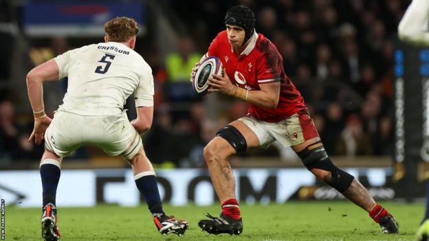 Dafydd Jenkins running at England player