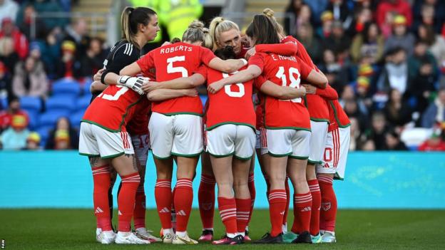 Wales team huddle pre-Northern Ireland