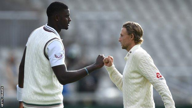 West Indies Cricket wins CMJ Spirit of Cricket award 1 Jason Holder (left) and Joe Root (right) fist pump after the second Test at Emirates Old Trafford