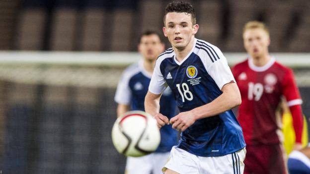 John McGinn in action for Scotland against Denmark in March