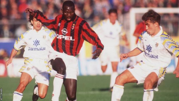George Weah playing for AC Milan against Parma