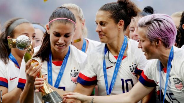 USA women lift the football World Cup trophy in 2019